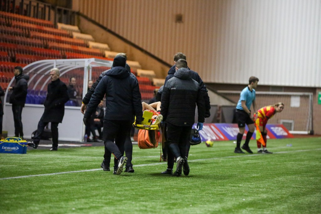 Cheryl McCulloch is stretchered off after injuring her ACL against Rangers